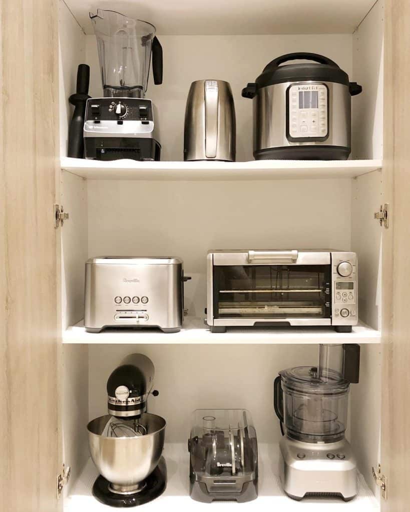 small appliances previously inhabited a lower cabinet