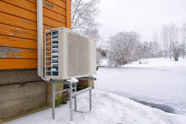 air-water heat pump outside in winter